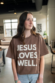 Cocoa Jesus Loves Well Front Tee