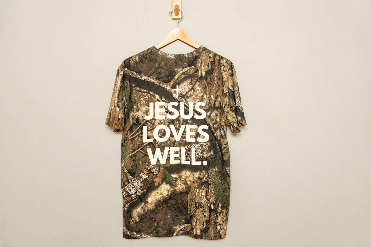 Jesus Loves Well Camo Tee