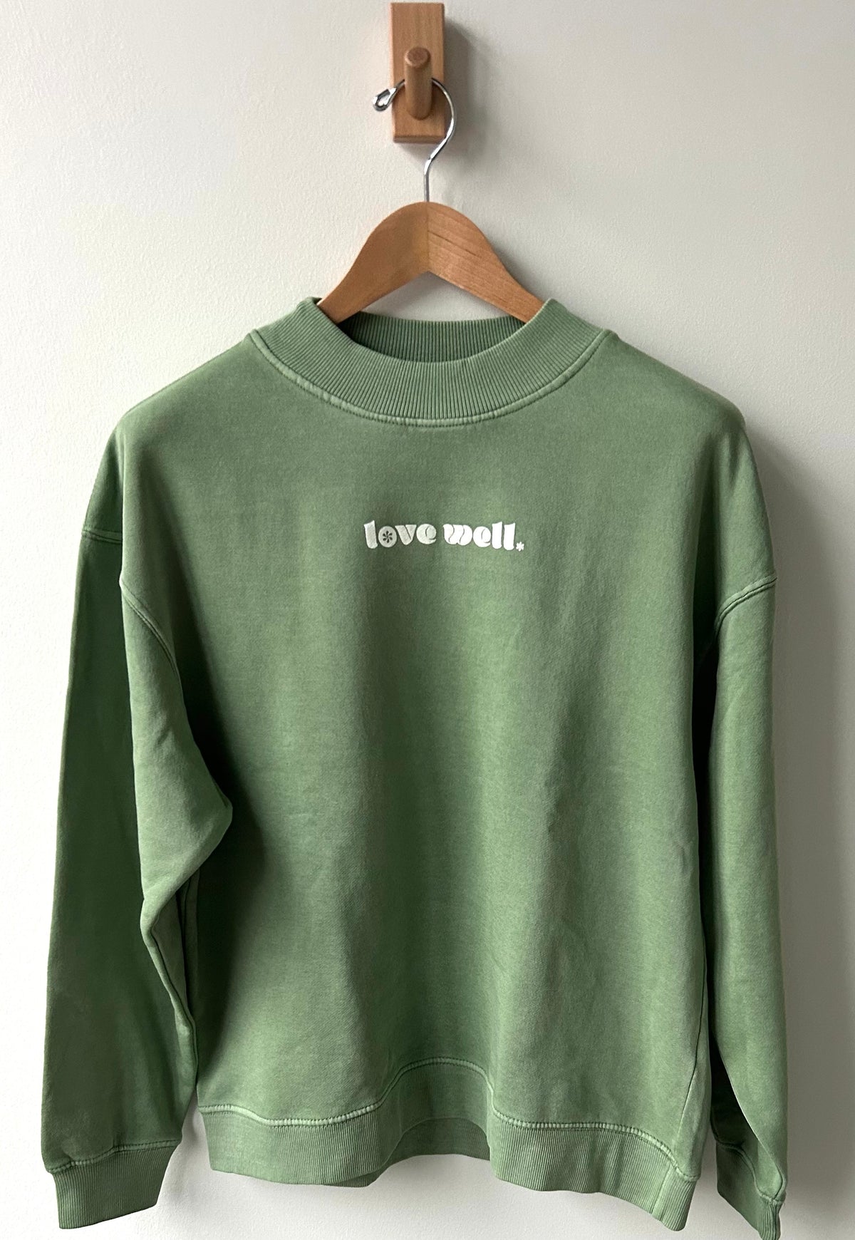 Love Well Groovy Daisy Mock Neck Sweatshirt in Sage Wash
