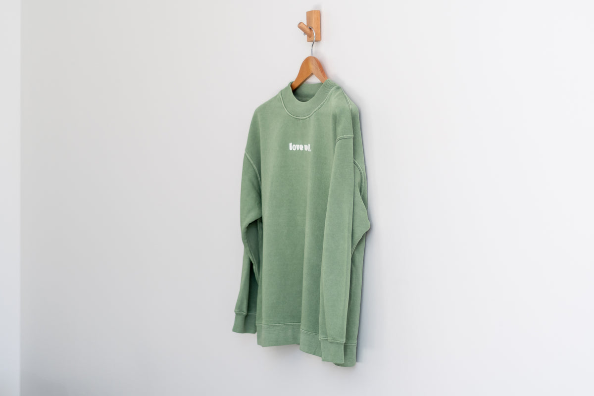 Love Well Groovy Daisy Mock Neck Sweatshirt in Sage Wash, side view