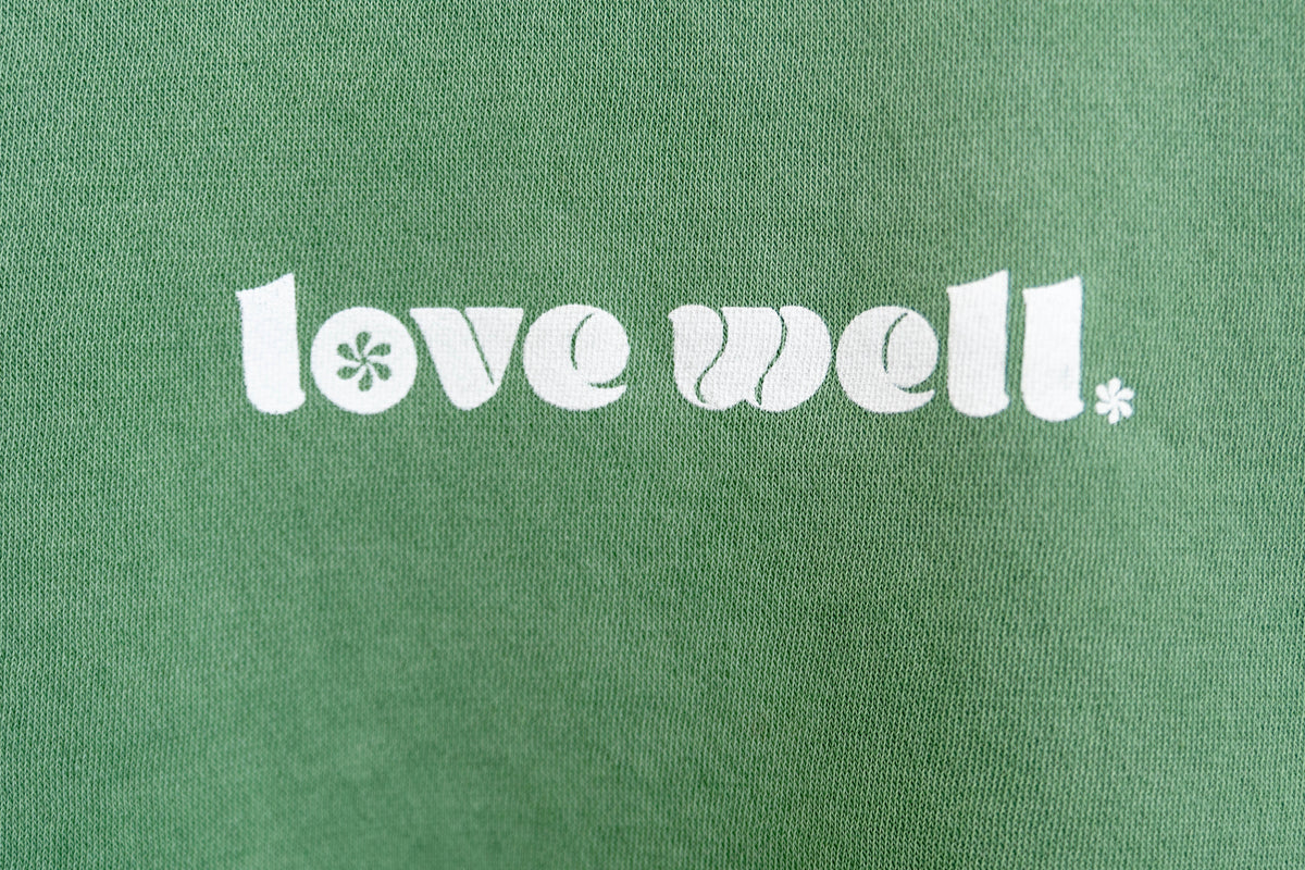 Love Well Groovy Daisy Mock Neck Sweatshirt in Sage Wash