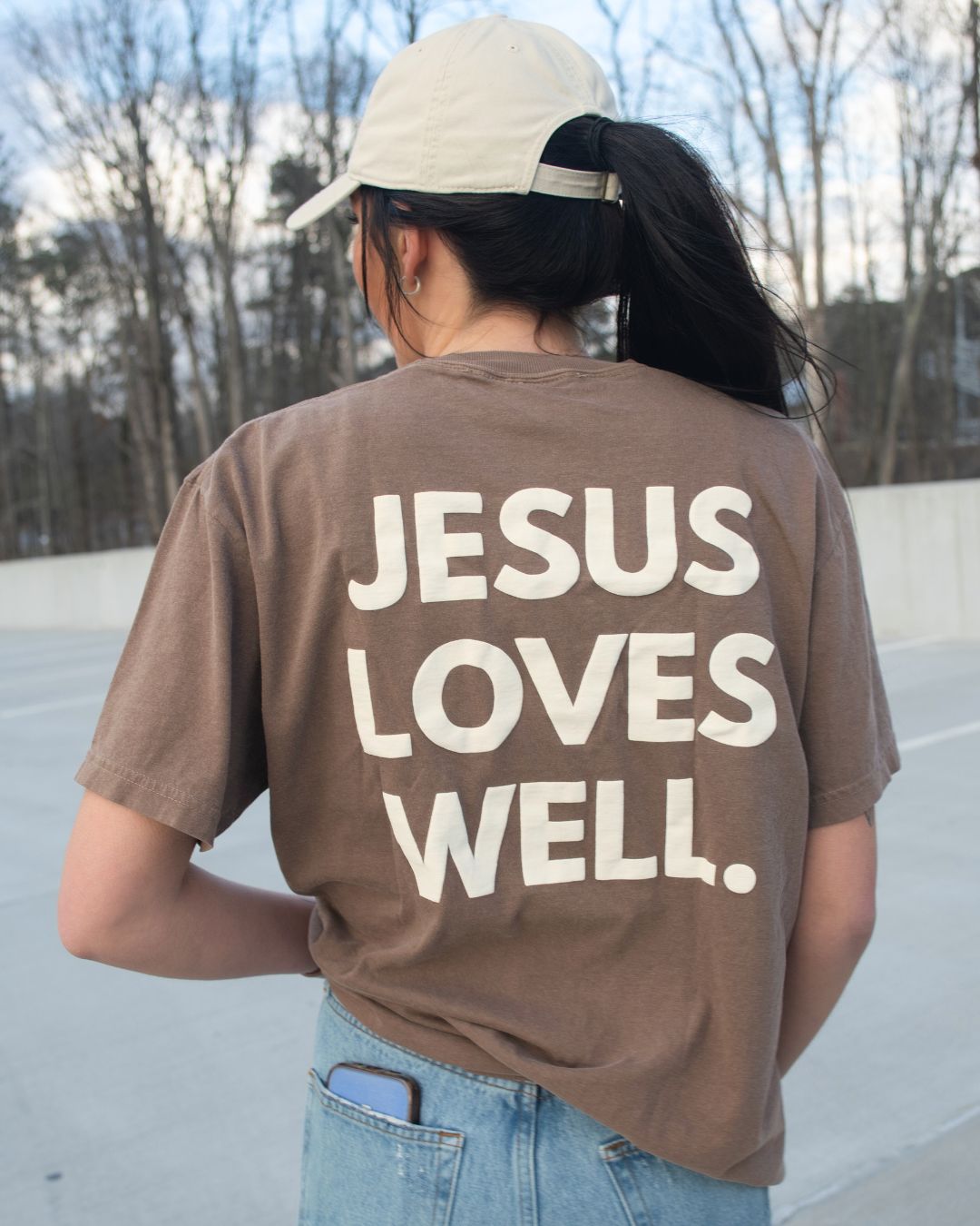 Love Well Jesus Loves Well Chest Cross Tee in Espresso