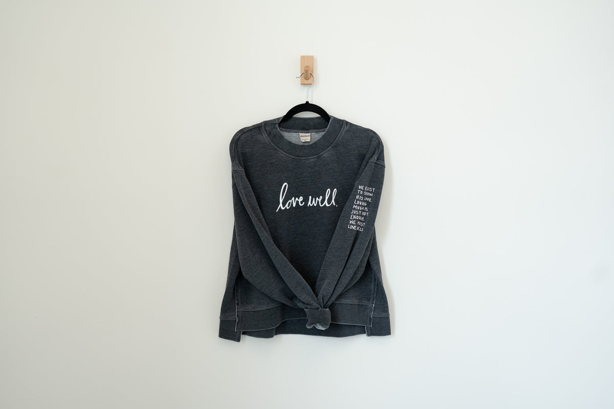 Love Well Original Script Boxy Mock Neck in Washed Black, front view