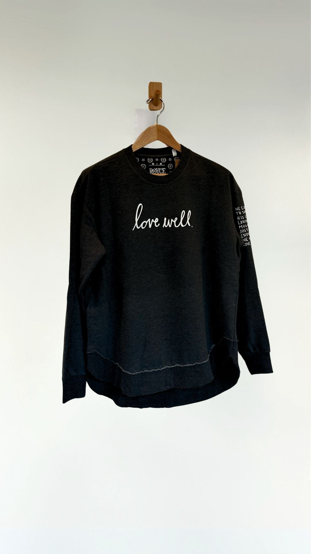 Love Well Original Script Poncho Sweatshirt in Black, front view