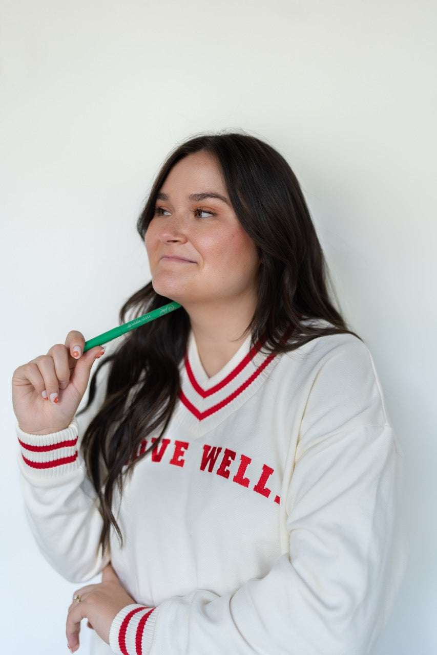 Love Well Vintage Ivy Varsity V-Neck Sweatshirt in Red