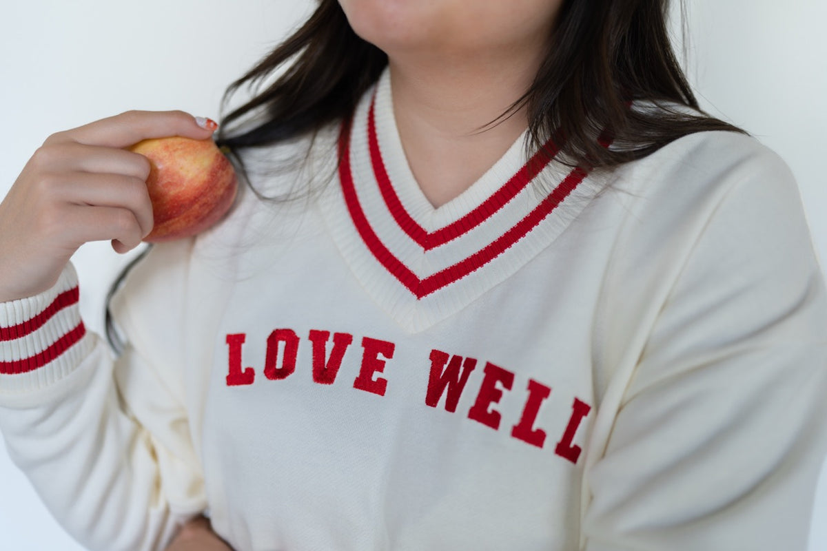 Love Well Vintage Ivy Varsity V-Neck Sweatshirt in Red